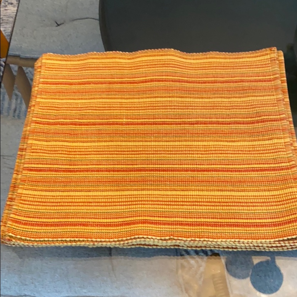 11 woven orange placemats